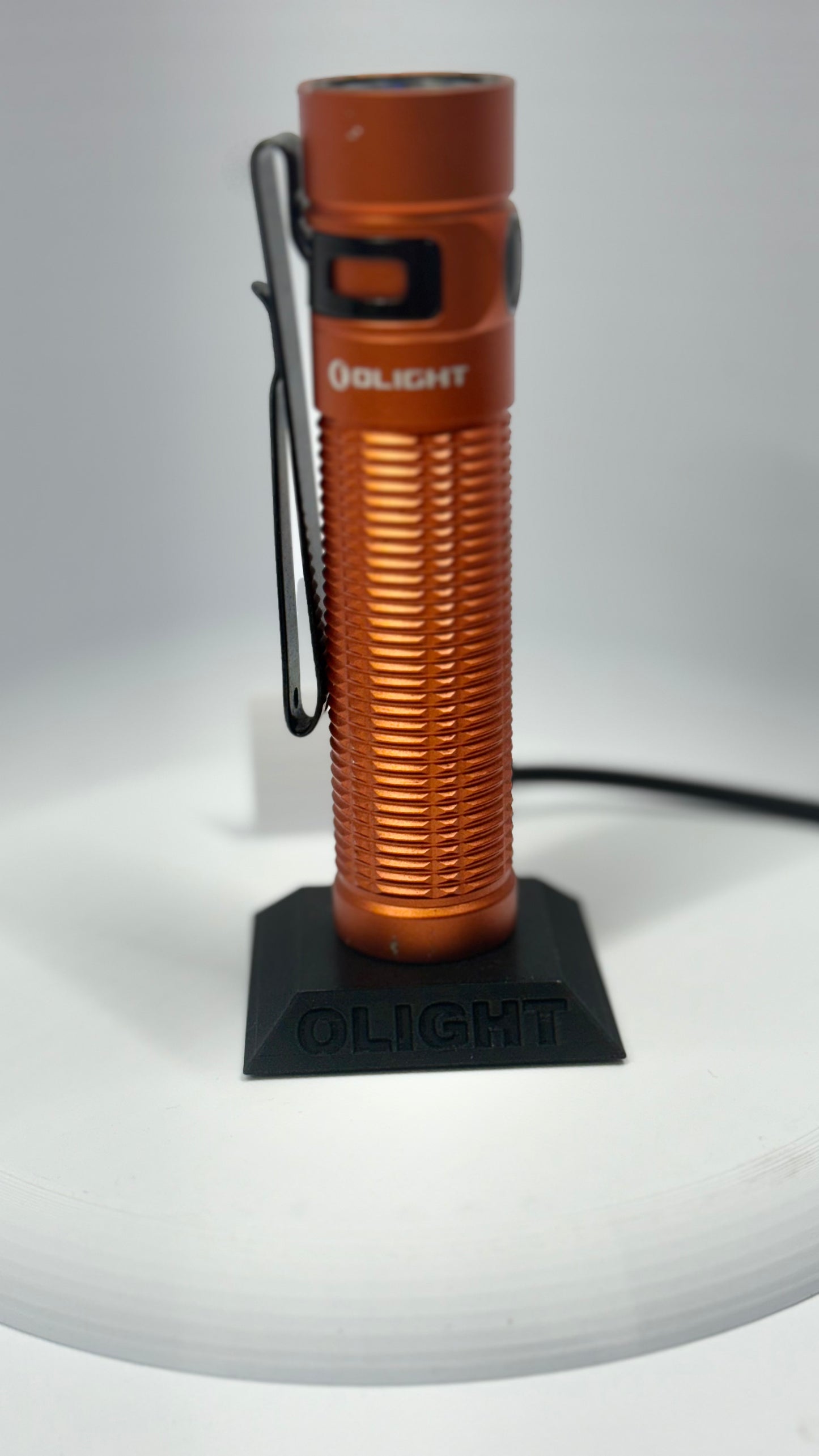 Olight Flashlight Magnetic Charging Dock – Flat mount